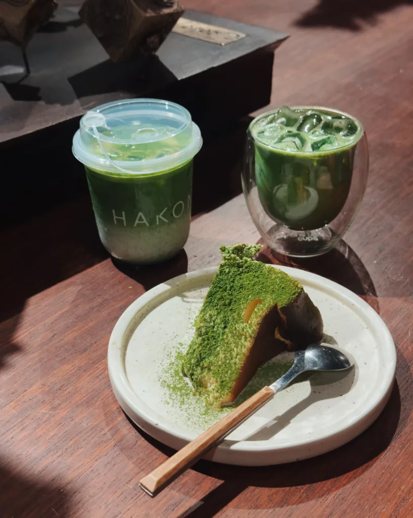 a plate of cake and a cup of iced green tea Things to Do in Jakarta